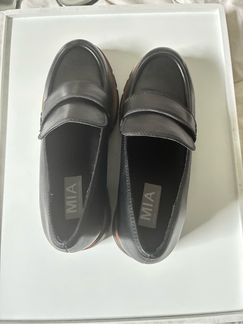 MIA Black Leather Slip-On Penny Loafers with Brown Sole Trim